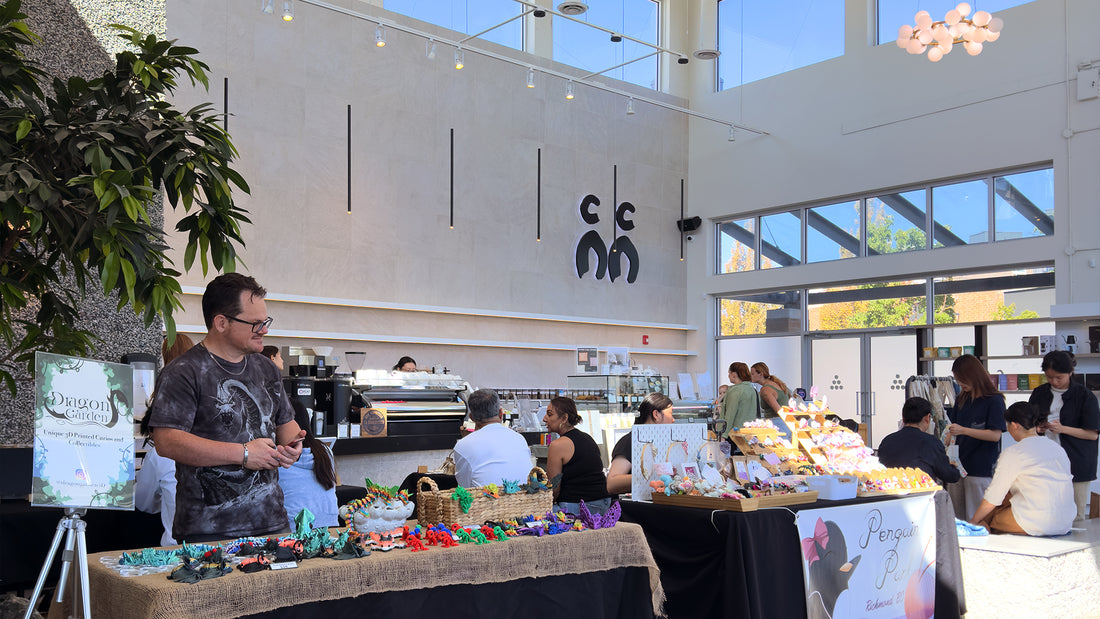 Vendors displaying their products at the lively C Market Coffee pop-up market, with visitors browsing and engaging in a welcoming and dynamic atmosphere.